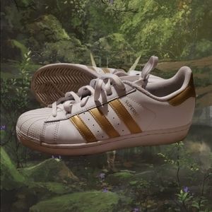 Adidas superstars sneakers gold color